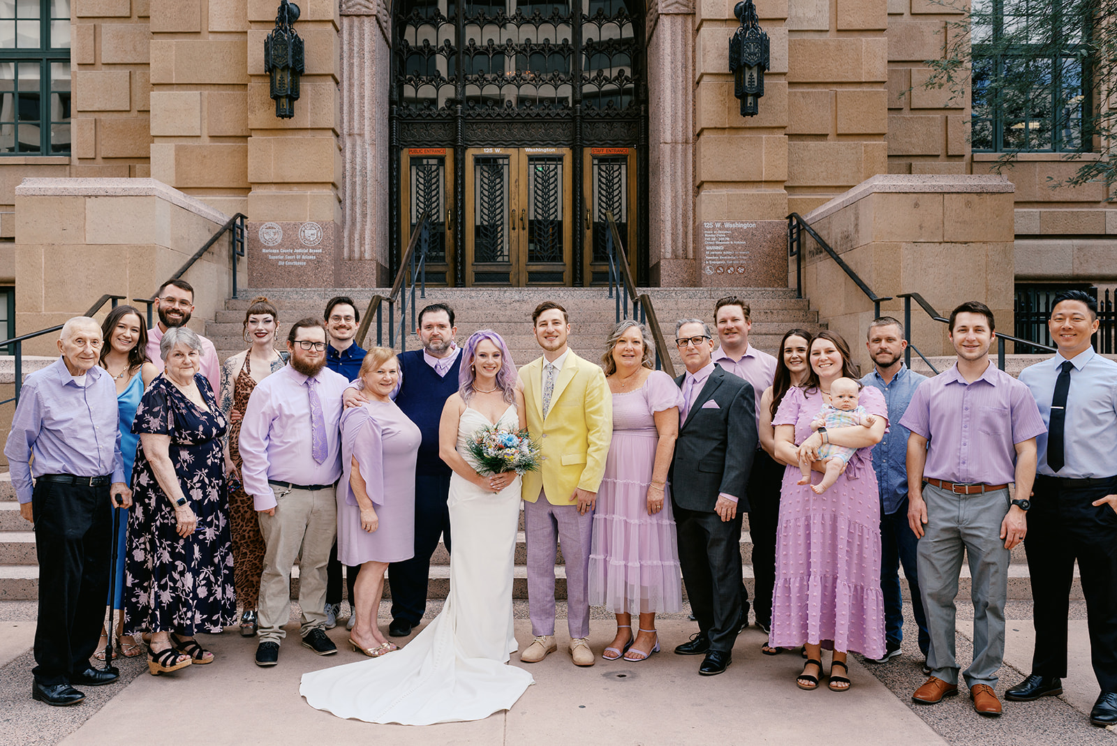 Large family group photo on the steps of Phoenix City Hall after a Phoenix Courthouse Wedding ceremony