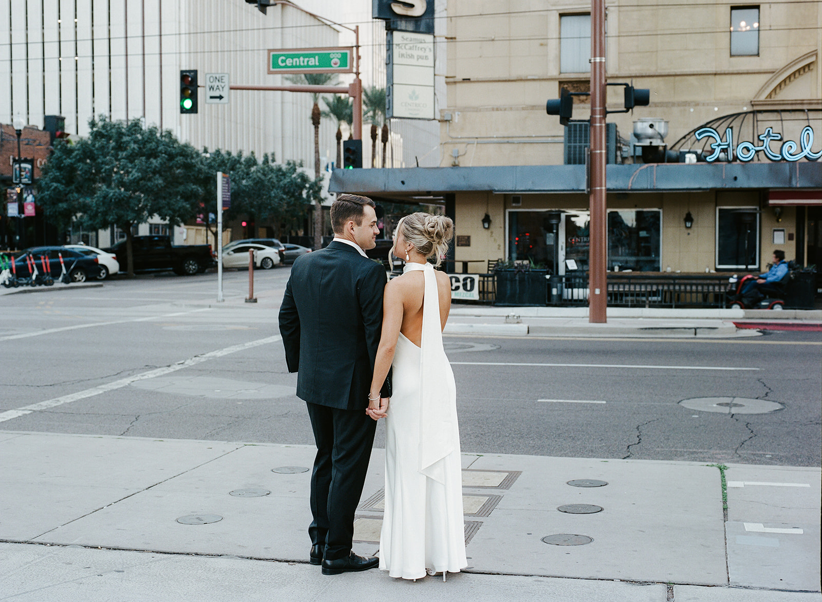 Phoenix courthouse wedding couple holding hands on the street