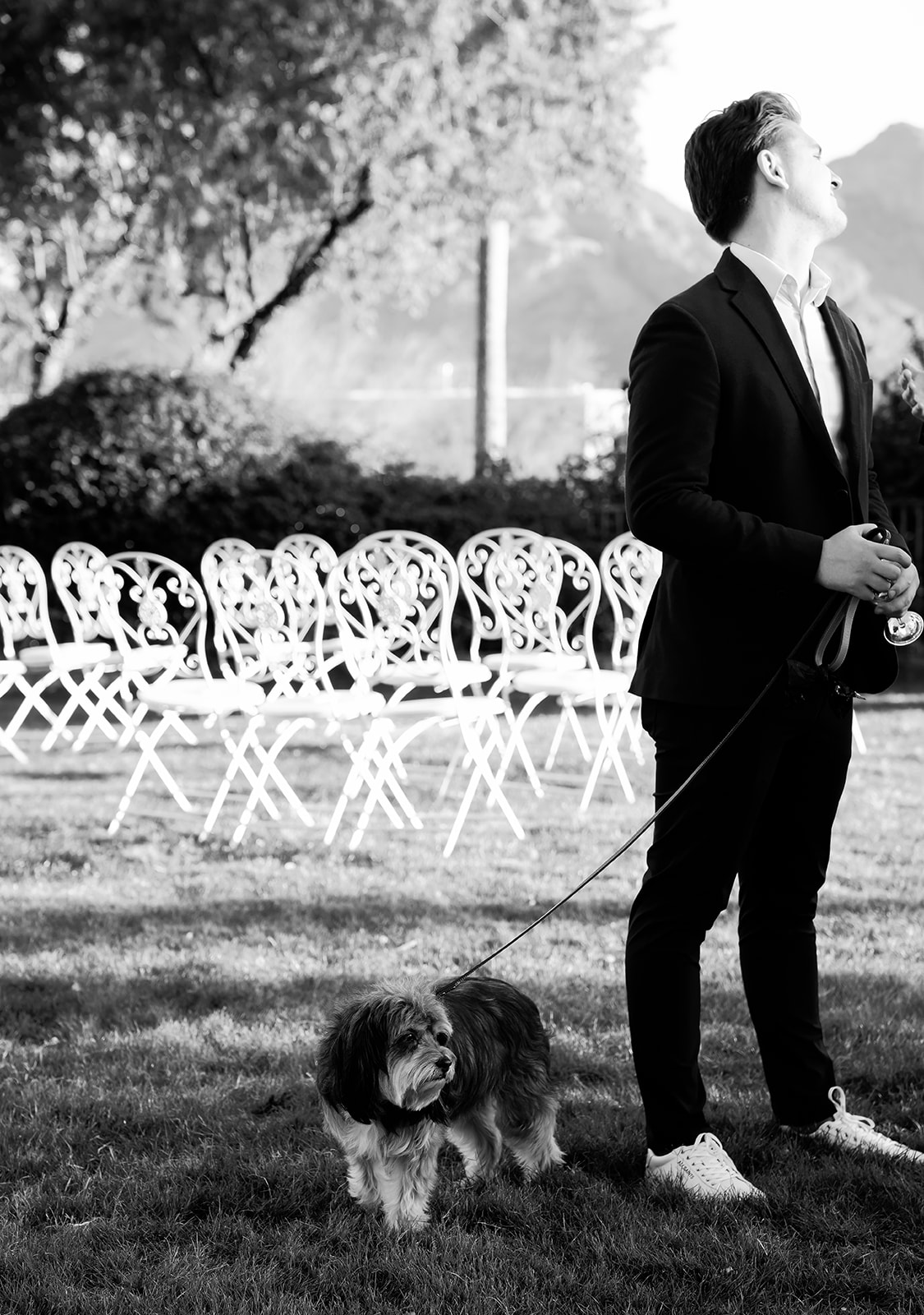Man with dog at the non-traditional wedding ceremony