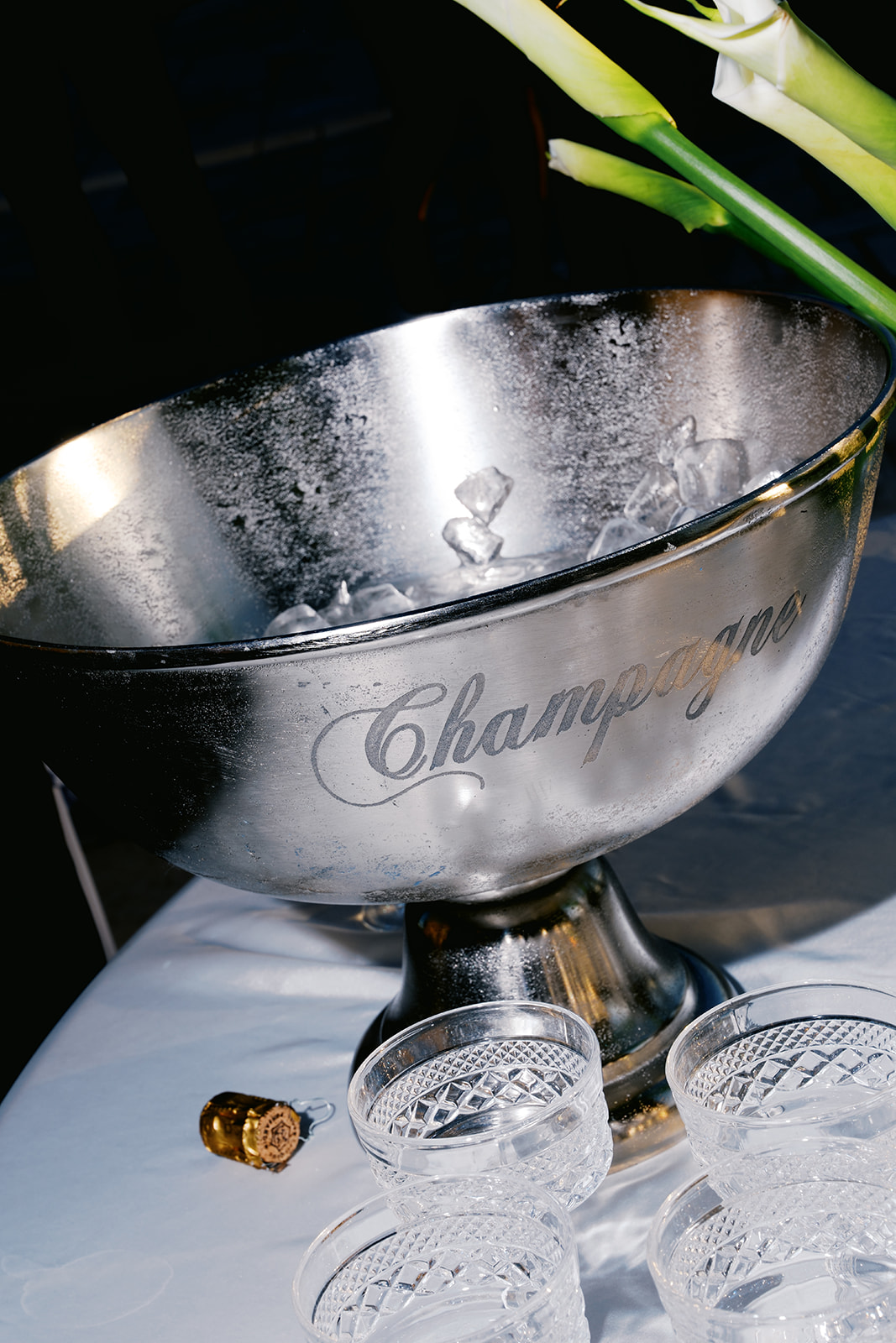 Champagne chilling in a bowl for wedding celebration