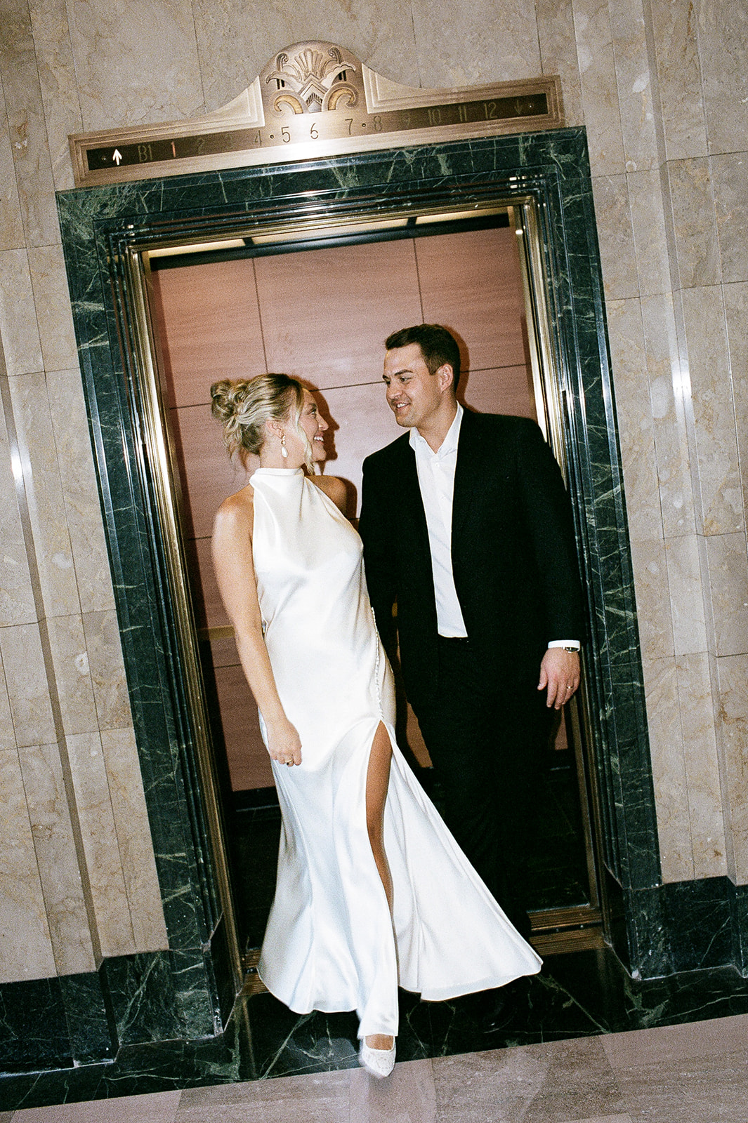 Phoenix courthouse wedding couple standing in elevator doorway