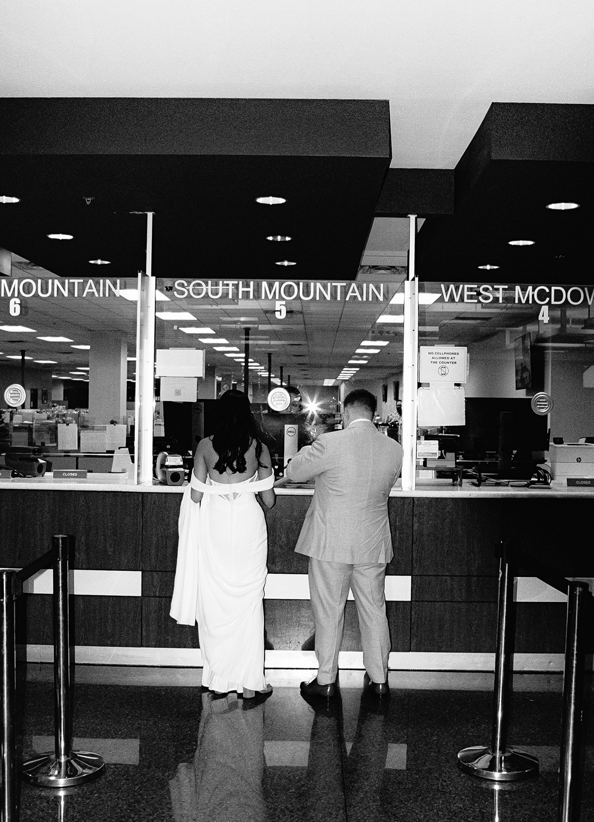 Phoenix courthouse wedding couple at service counter indoors
