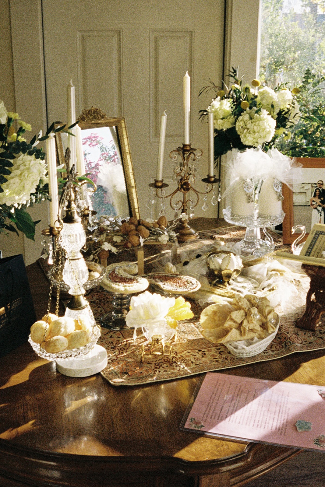 Elegant table setting with flowers and candles at wine bar