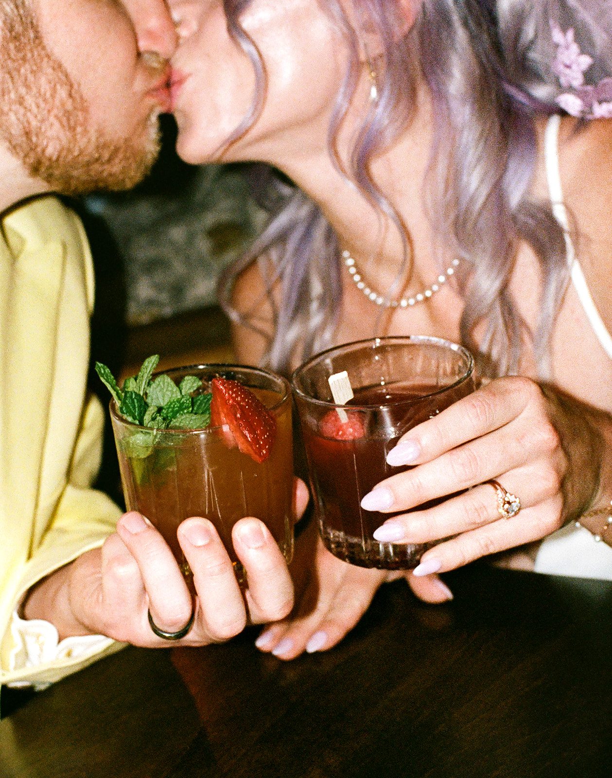 Phoenix courthouse wedding couple toasting cocktails and kissing