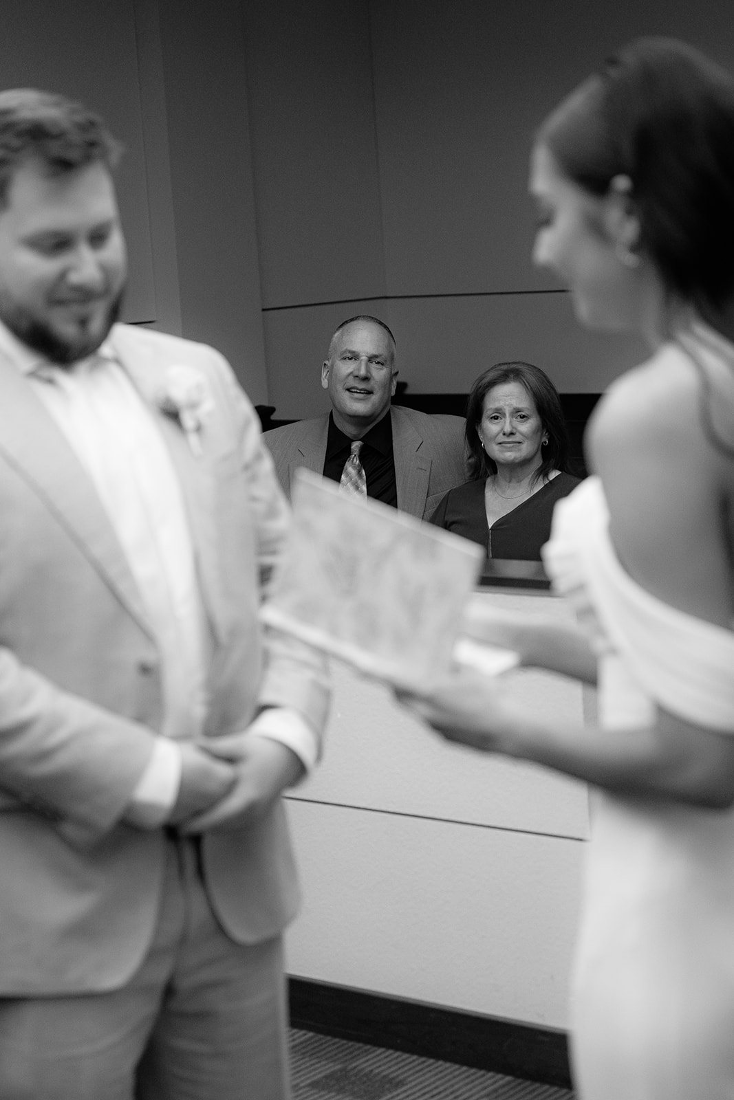 Phoenix courthouse wedding couple exchanging documents and smiling