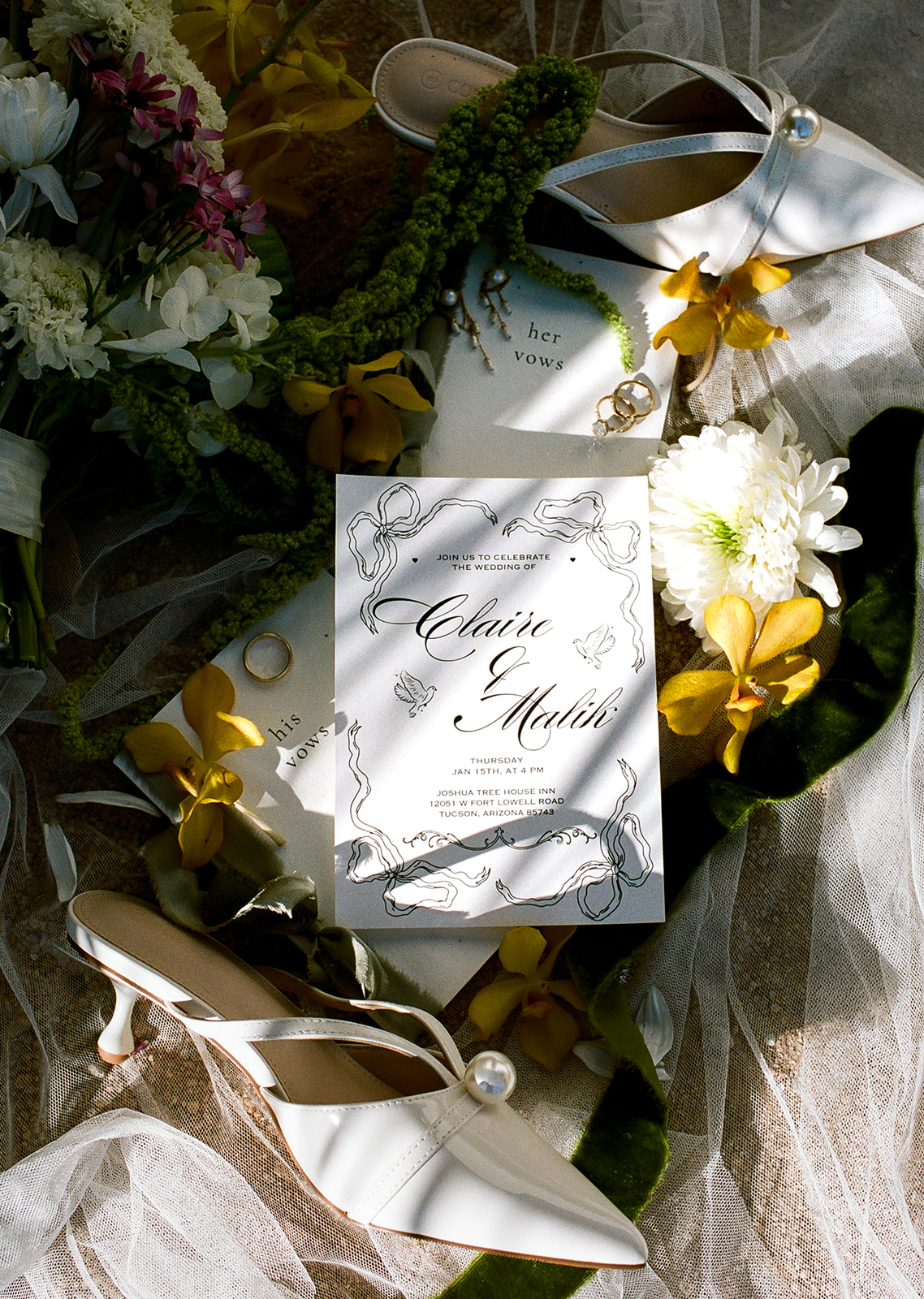 Joshua Tree House Tucson wedding invitation styled with florals and sunlight